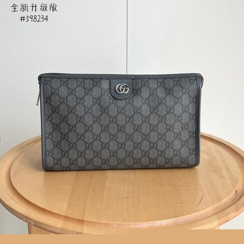 G*u*i clutch bags